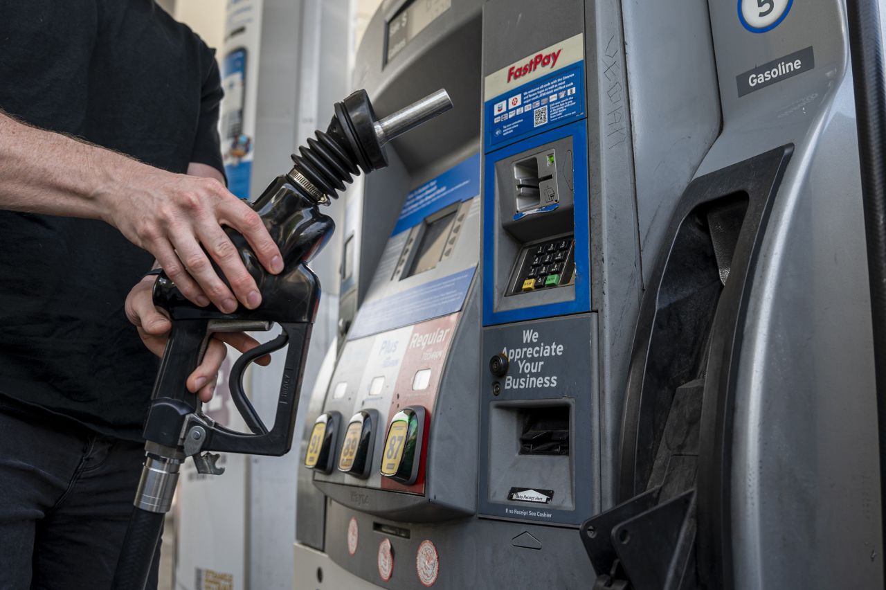 A customer refuels at a Chevron gas station in San Francisco, California, on November 21.