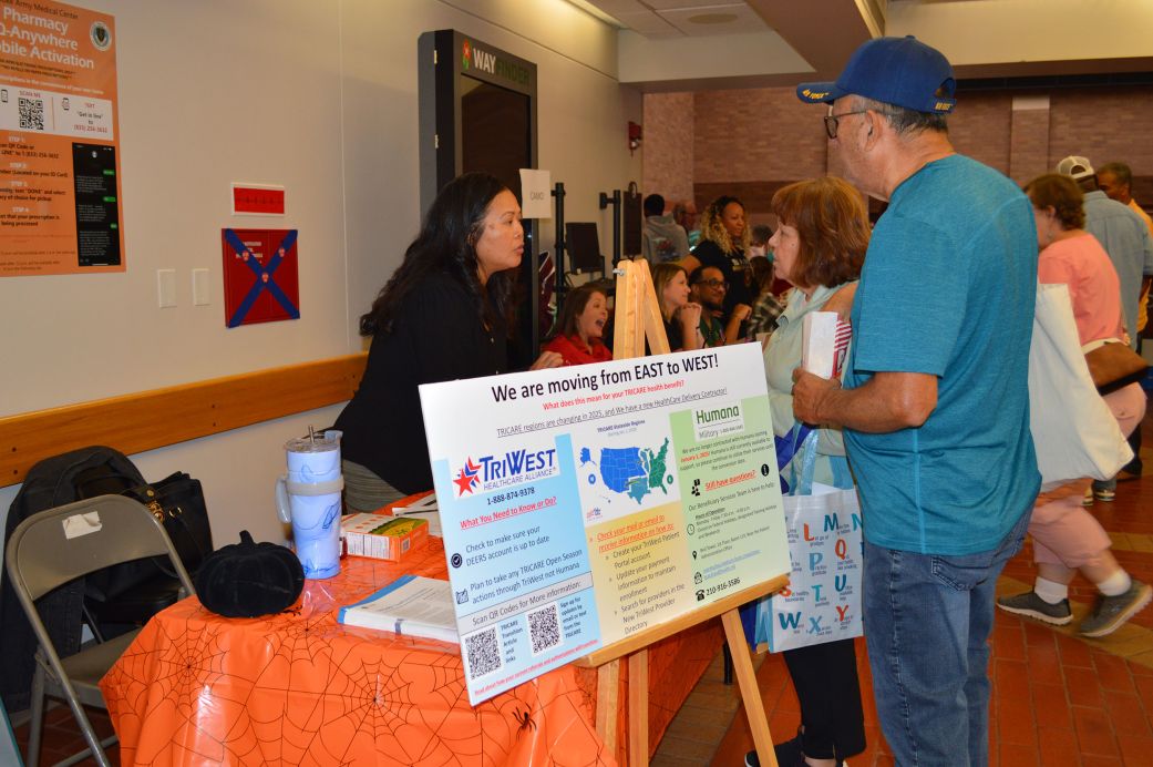 A benefits agent talks to retirees about Tricare changes in Texas at Brooke Army Medical Center, on JBSA-Fort Sam Houston, Texas.