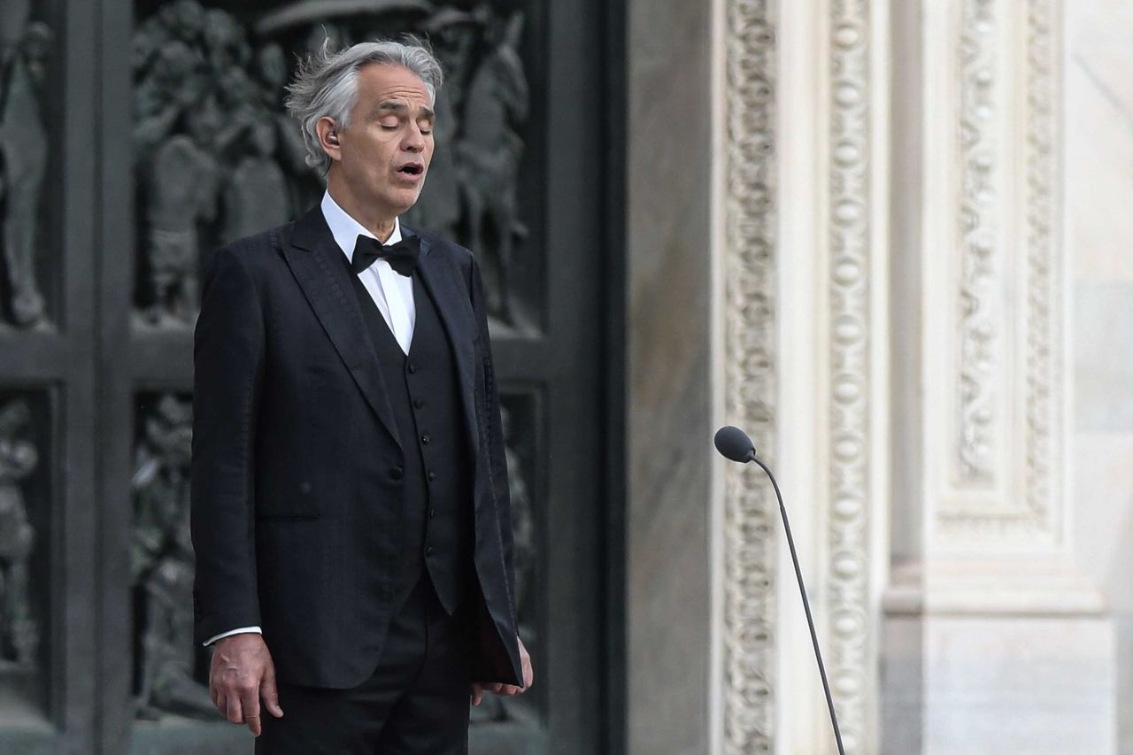 Italian tenor and opera singer Andrea Bocelli sings during a rehearsal in the Piazza del Duomo in Milan, prior to an evening performance during the country's lockdown on April 12.