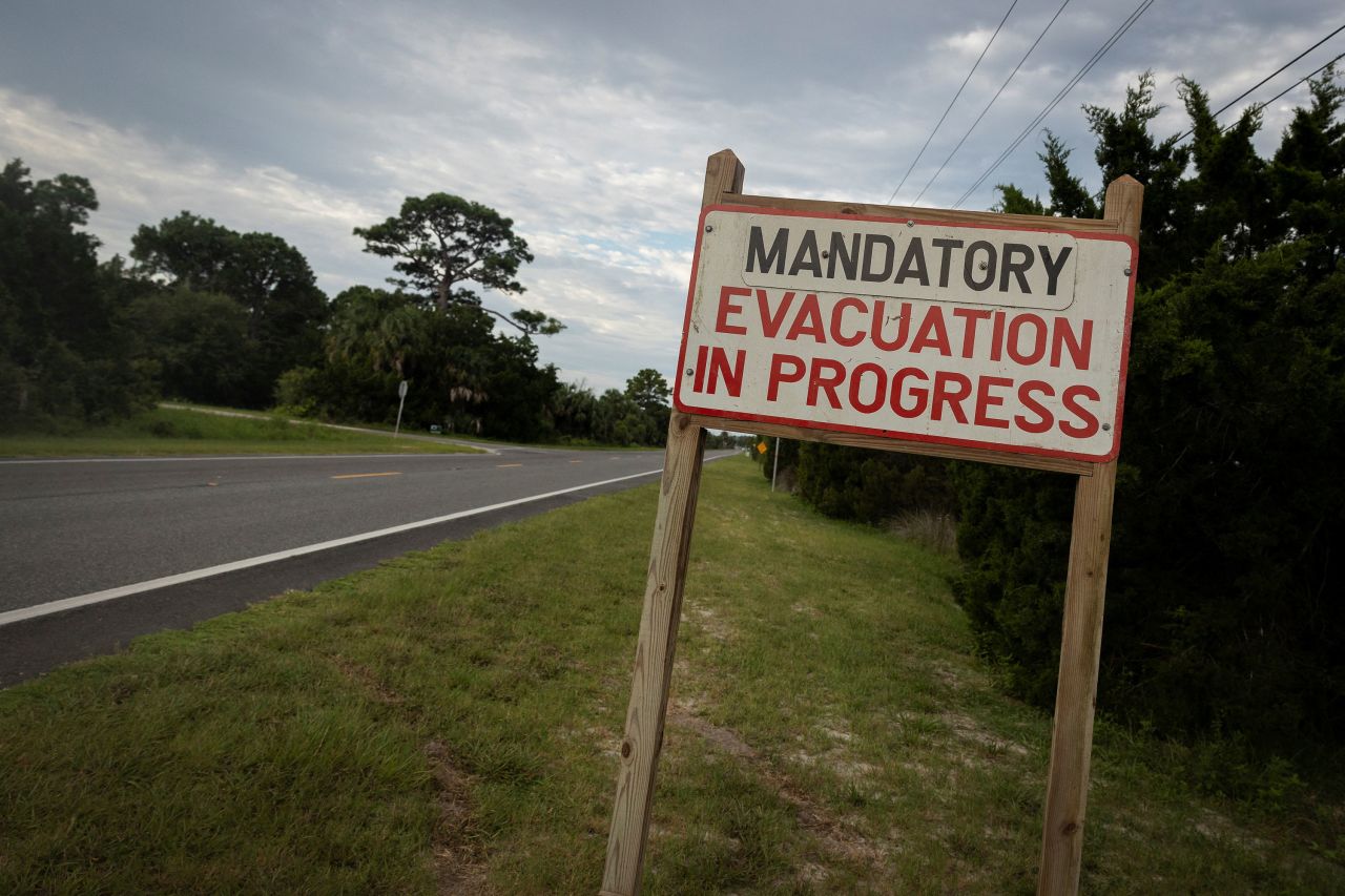 A mandatory evacuation sign is displayed in Cedar Key, Florida, on Tuesday.