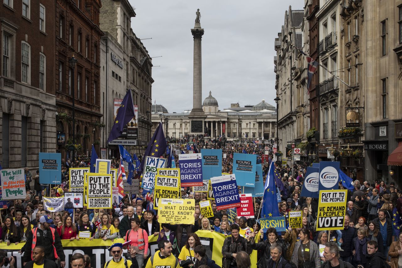 Protesters take part in the Put It To The People March on Whitehall on March 23 in London, England.