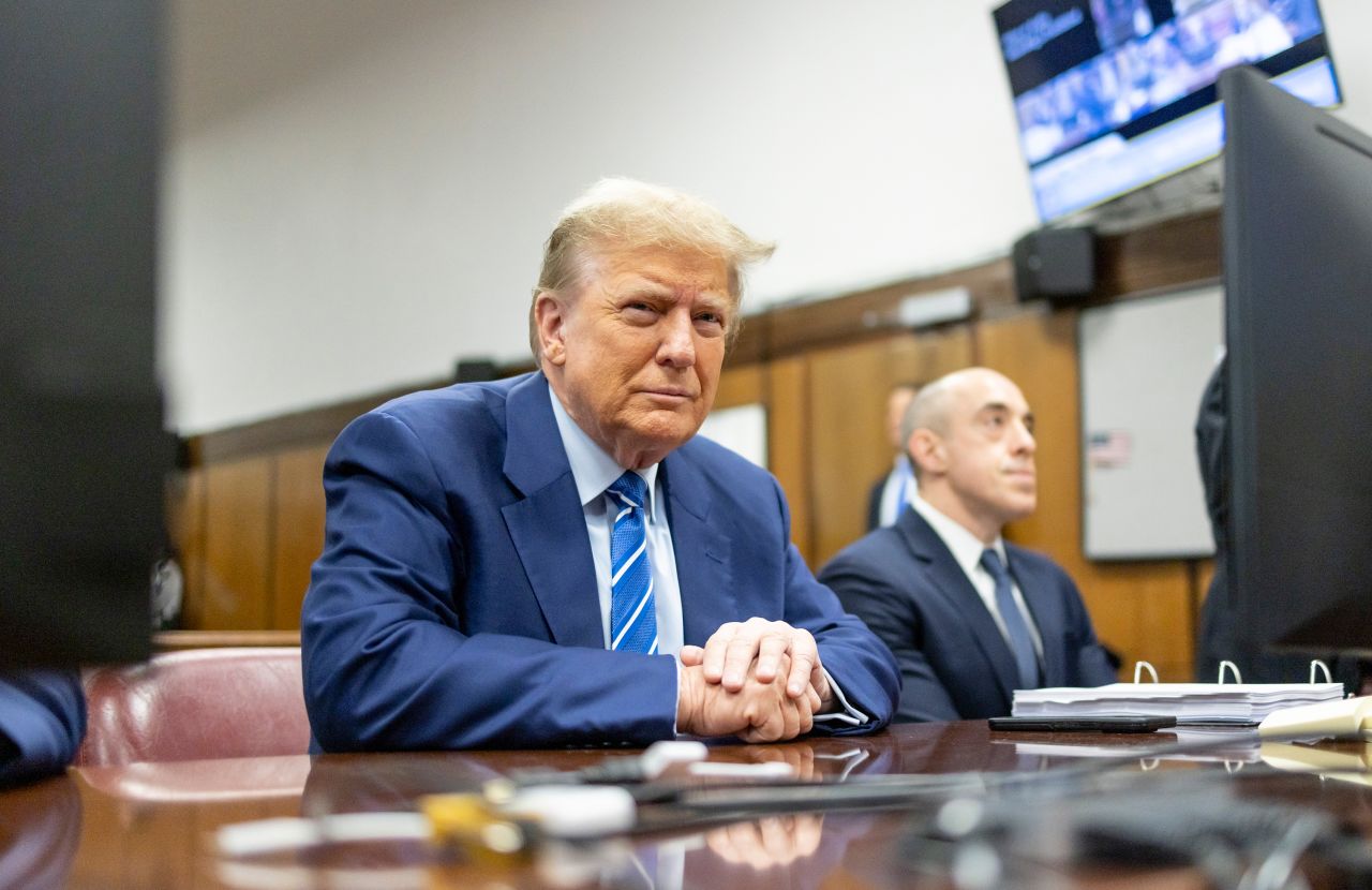 Former President Donald Trump sits in the courtroom during the second day of his criminal trial at Manhattan Criminal Court in New York on Tuesday.