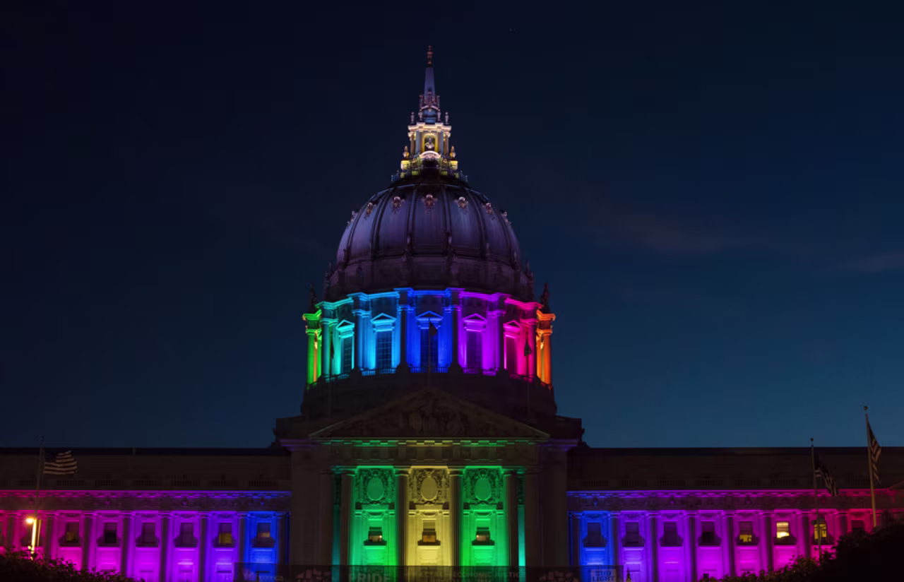 San Francisco City Hall is lit up in rainbow colors following Gay Pride in San Francisco, California on Sunday, June, 26, 2016.