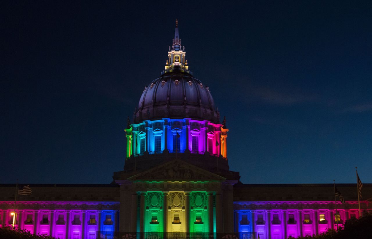 San Francisco City Hall is lit up in rainbow colors following Gay Pride in San Francisco, California on Sunday, June, 26, 2016.