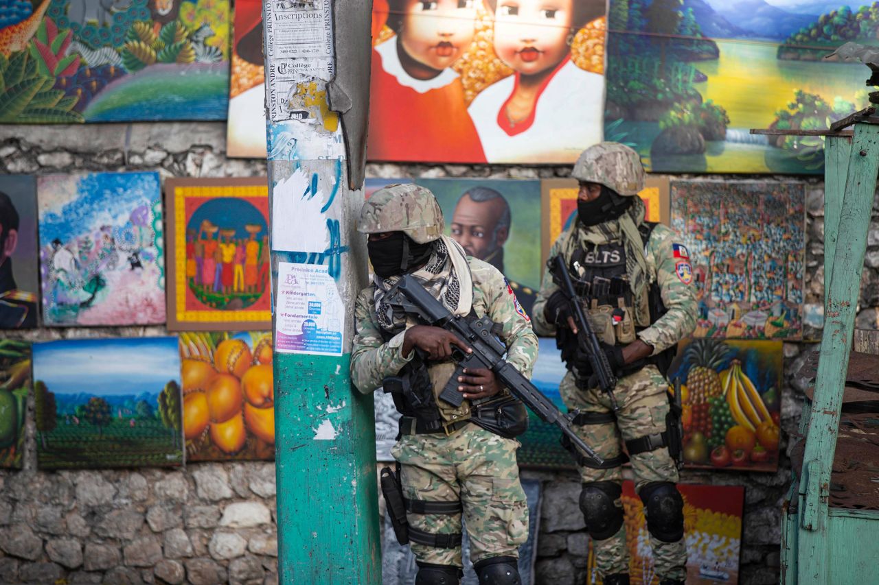 Soldiers patrol the Petion Ville neighborhood of Port-au-Prince on Wednesday.