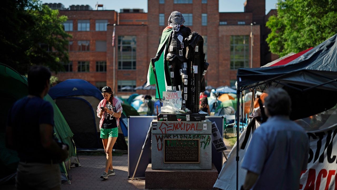 A George Washington statue is seen vandalized at a pro-Palestinian encampment at George Washington University on Thursday.