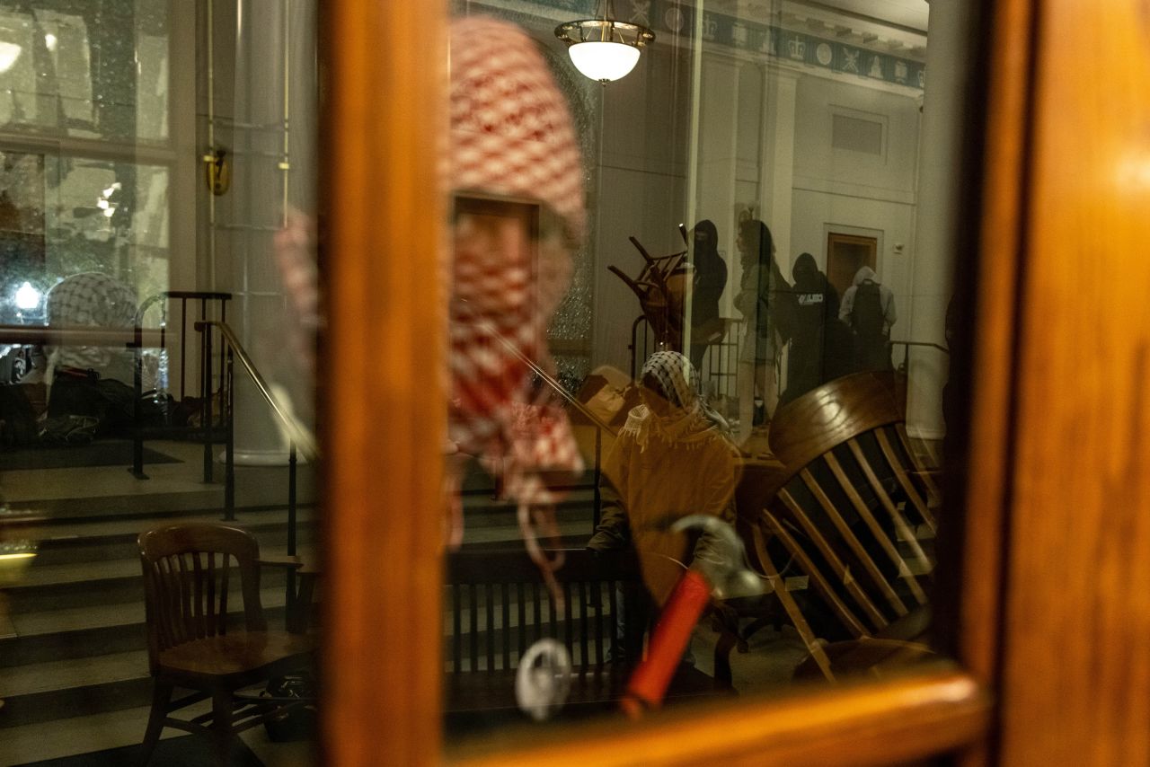 Demonstrators supporting Palestinians in Gaza barricade themselves inside Columbia University's Hamilton Hall in New York City on April 30.