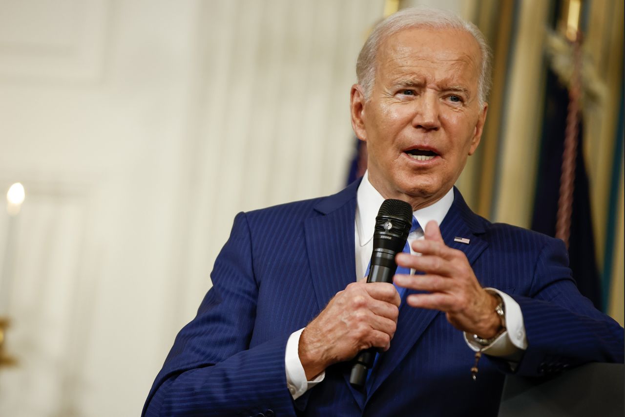 US President Joe Biden speaks with reporters in the State Dining Room at the White House on November 9.
