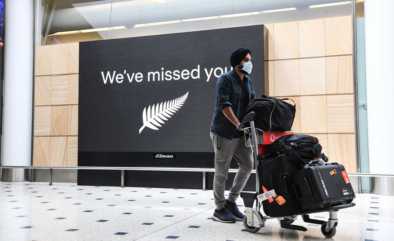 A passenger from Auckland, New Zealand arrives at Sydney's Kingsford Smith Airport in Sydney, Australia, on Oct. 16.