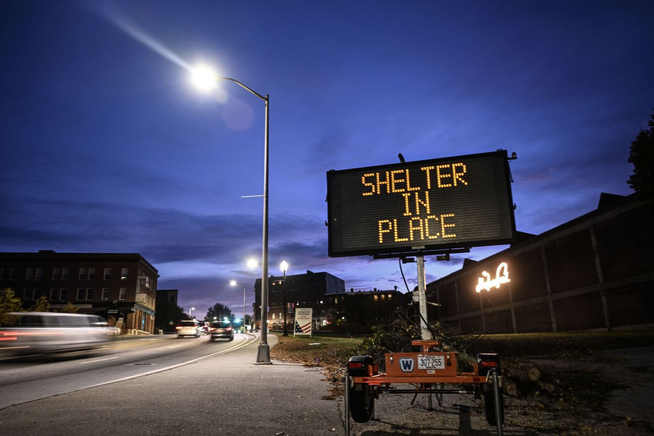 A road sign in Lewiston reads "Shelter in Place."