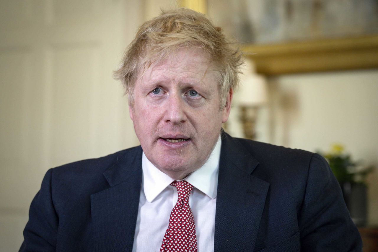 British Prime Minister Boris Johnson speaks at 10 Downing Street after being discharged from hospital in London on April 12.