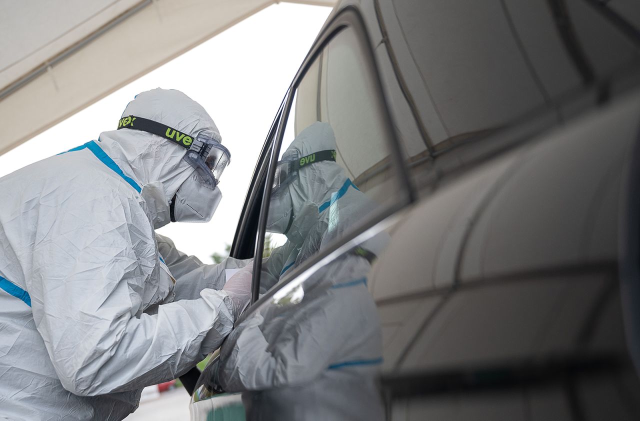 An employee carries out a smear test at a Covid-19 testing site in Baden-Württemberg, Heilbronn in Germany, on October 21.