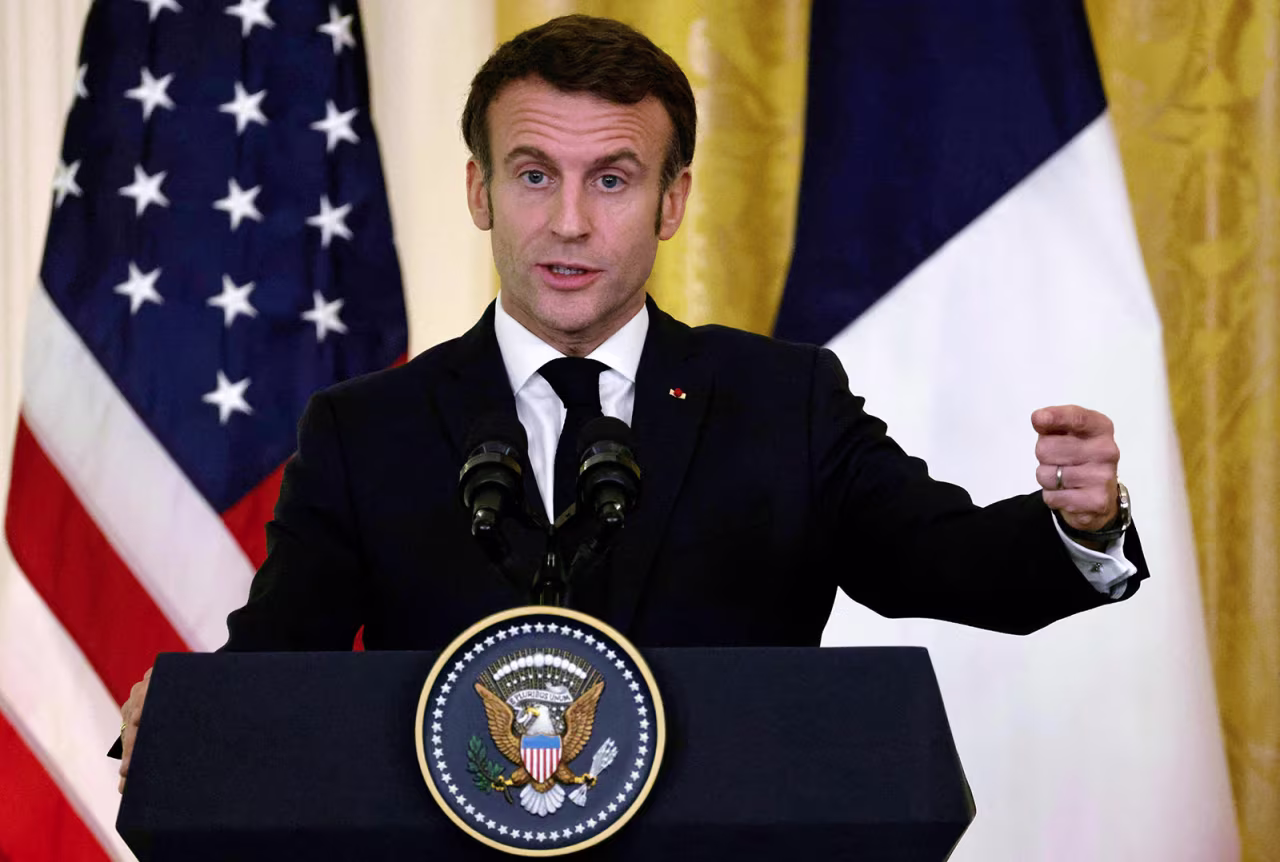 French President Emmanuel Macron speaks during a press conference at the White House on Thursday. 