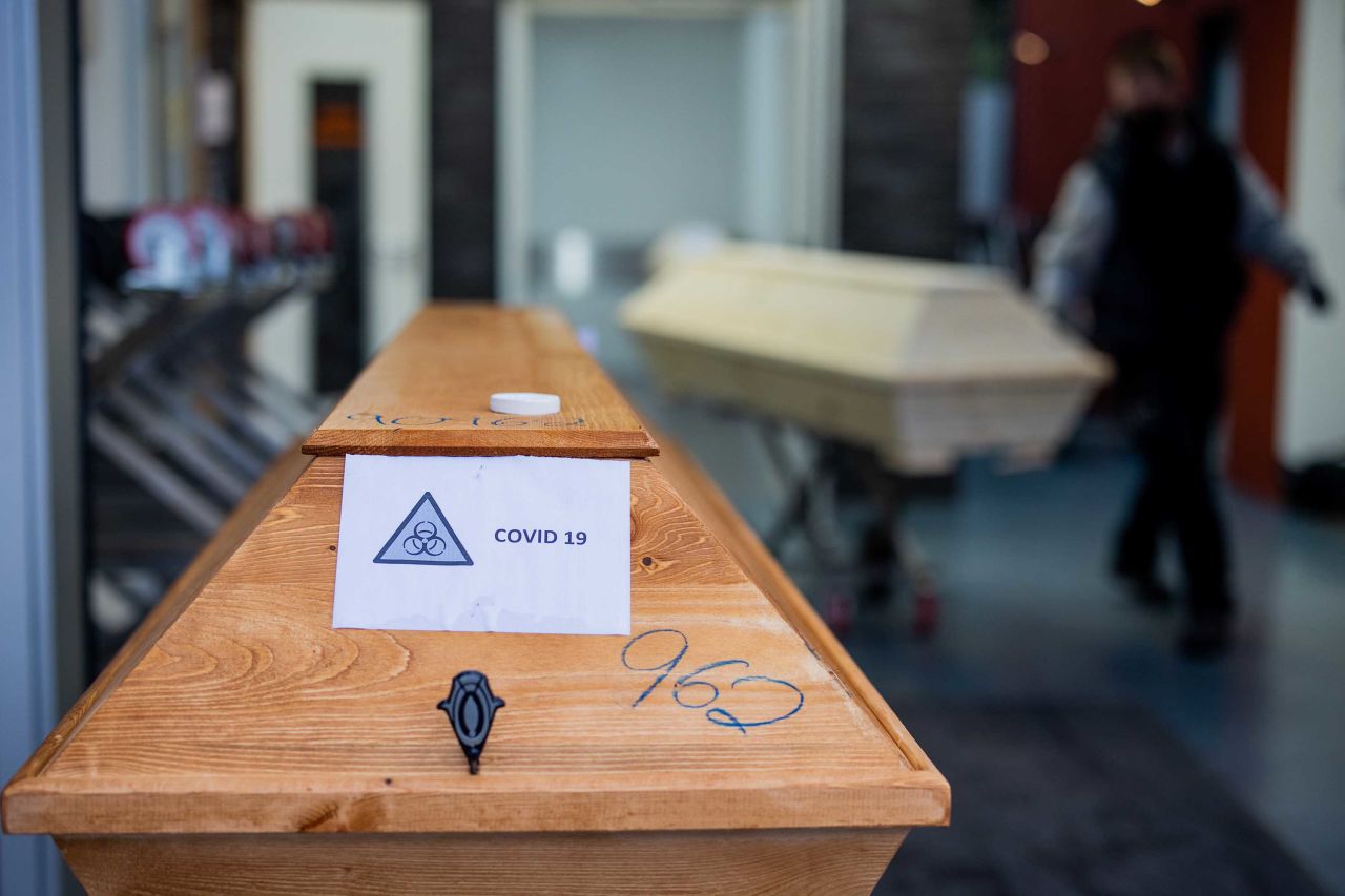 A coffin labeled with the inscription "Covid 19" is pictured at a crematorium in Dülmen, Germany, on January 19. 