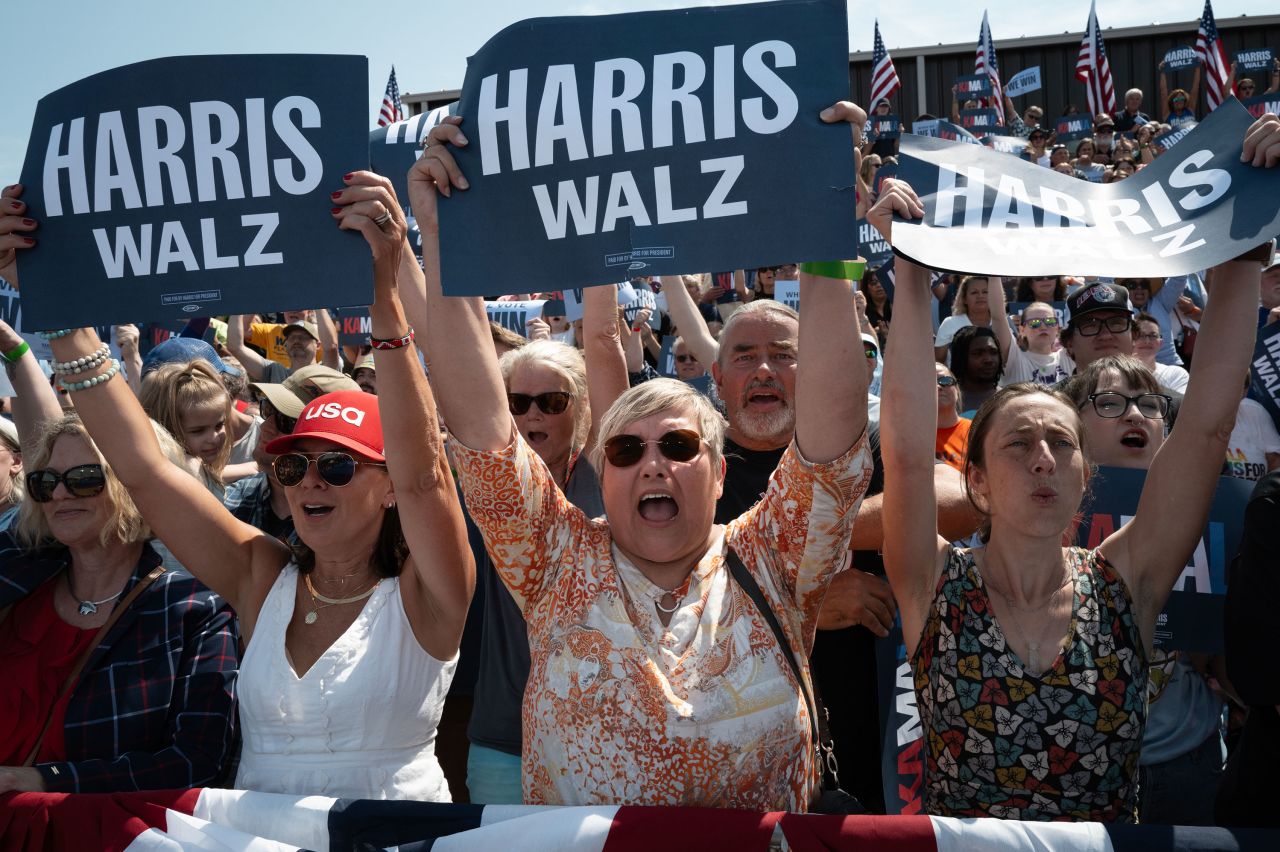 People attend a campaign rally with Vice President Kamala Harris and running mate Minnesota Gov. Tim Walz in Eau Claire, Wisconsin, on August 7. 