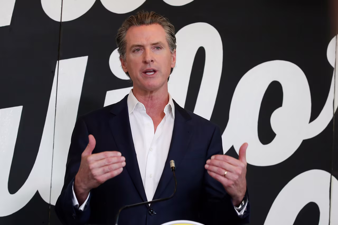 Gov. Gavin Newsom discusses his plan for the gradual reopening of California businesses during a news conference at the Display California store in Sacramento, California on Tuesday, May 5.