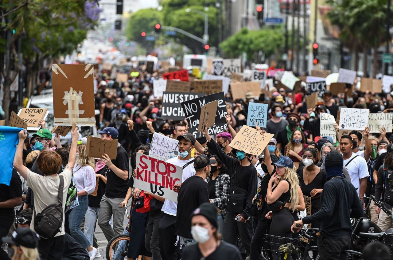 Demonstrators march through the streets on June 2 in Los Angeles.