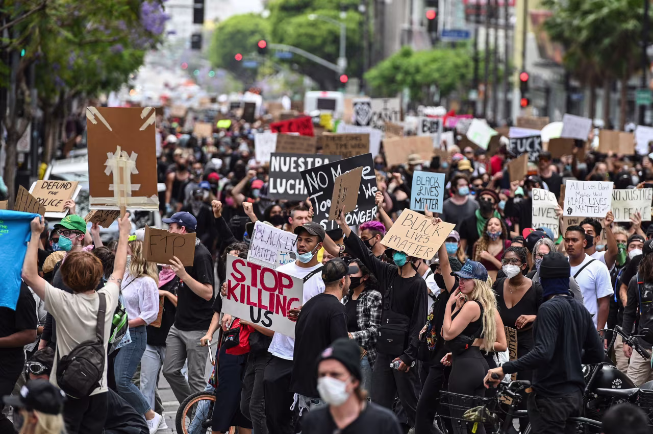 Demonstrators march through the streets on June 2 in Los Angeles.