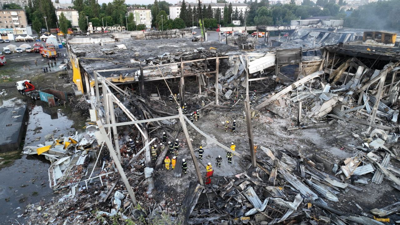 Rescuers work at a site of a shopping mall hit by a Russian missile strike in?Kremenchuk, Ukraine, on June 28.