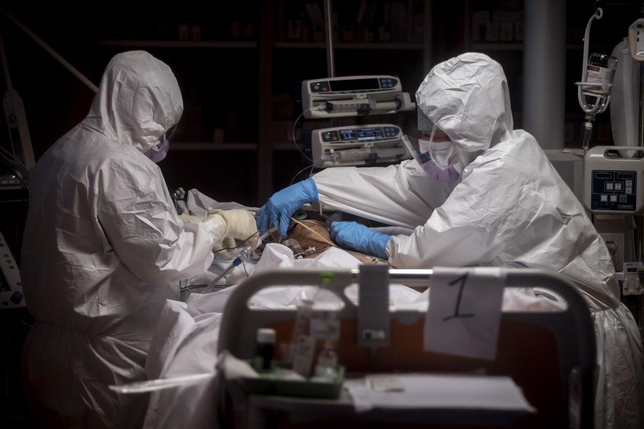 Doctors treat a coronavirus patient at a hospital in Rome, Italy, on March 26.