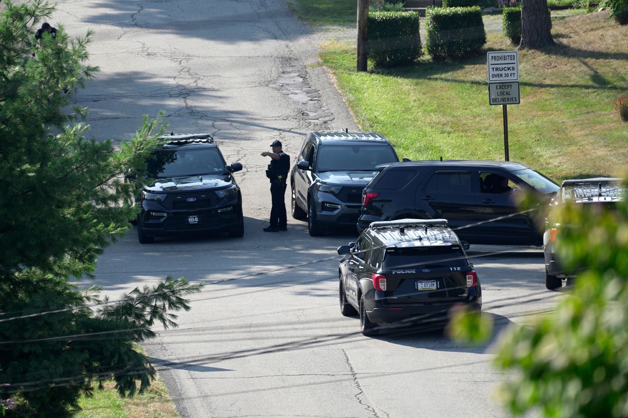 Law enforcement block a street near the residence of Thomas Matthew Crooks in Bethel Park, Pennsylvania, on Sunday, July 14. 