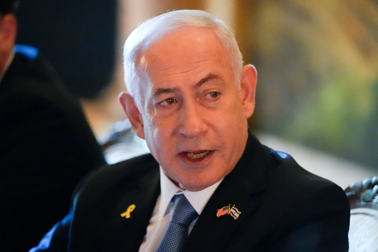 Israeli Prime Minister Benjamin Netanyahu speaks while meeting with former President Donald Trump at his Mar-a-Lago estate on Friday in Palm Beach, Florida. 