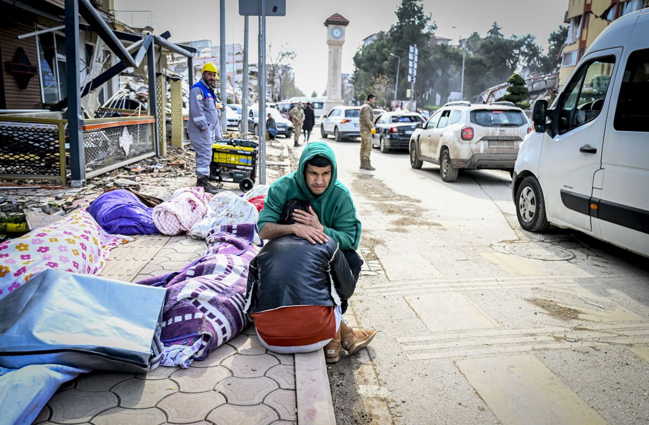 Earthquake survivors cry on the street in Hatay, Turkey on February 07.