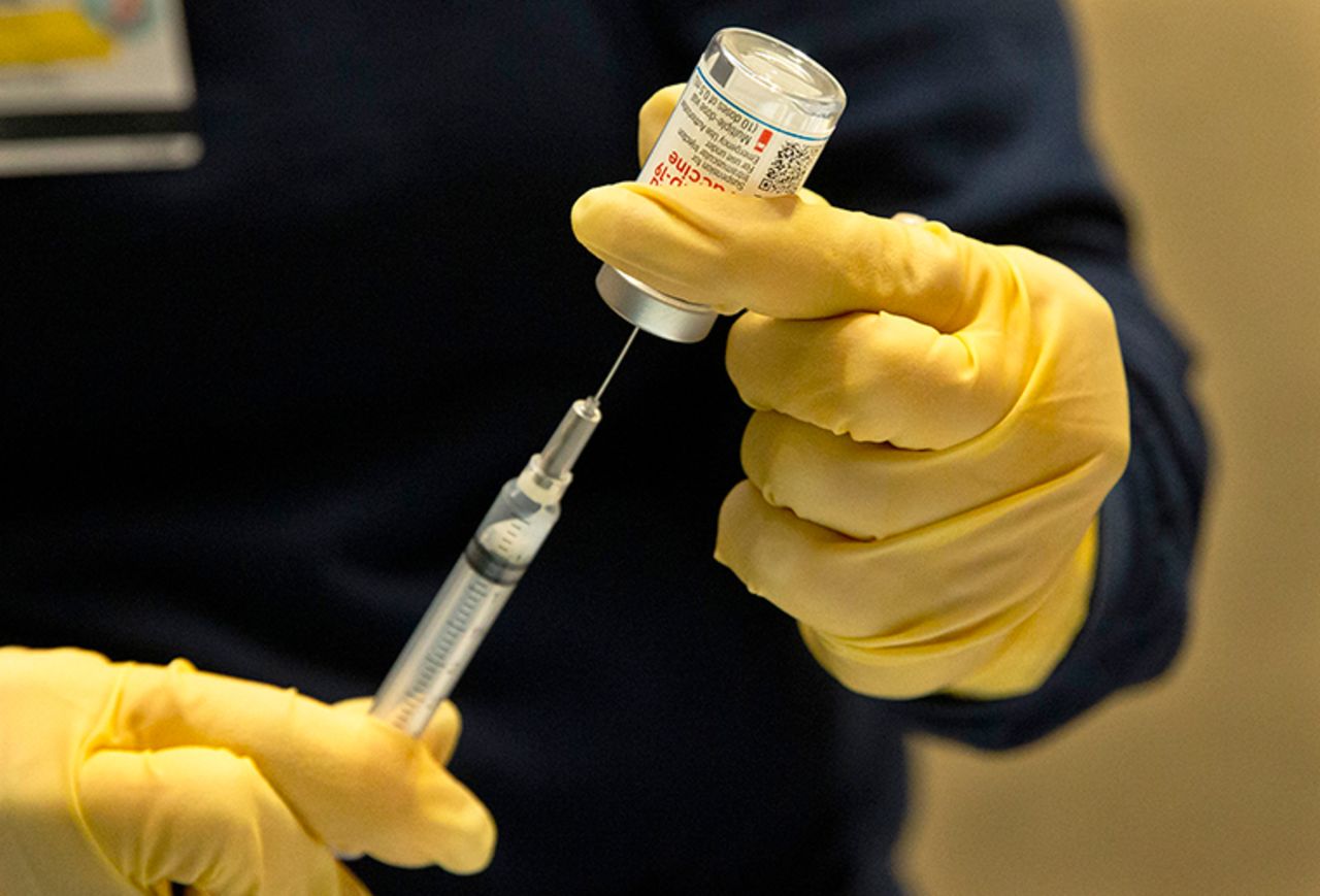 Houston Health Department LVN Alicia Meza prepares a dose of COVID-19 vaccine Sunday, January 3, at Houston Health Department's COVID-19 vaccine clinic in Houston.