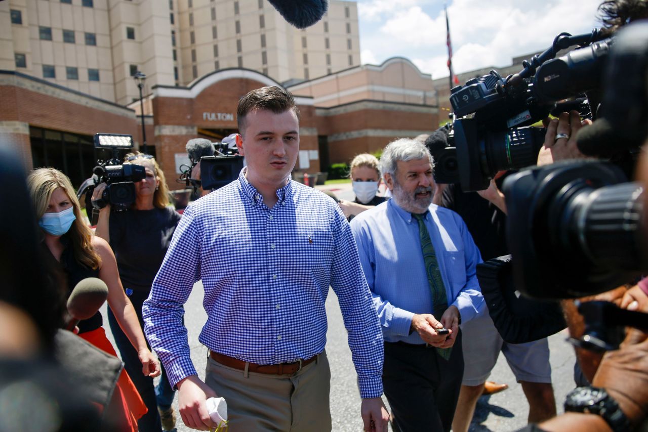 Atlanta Police officer Devin Brosnan is surrounded by media following his release from the Fulton County Jail on June 18 in Atlanta. 