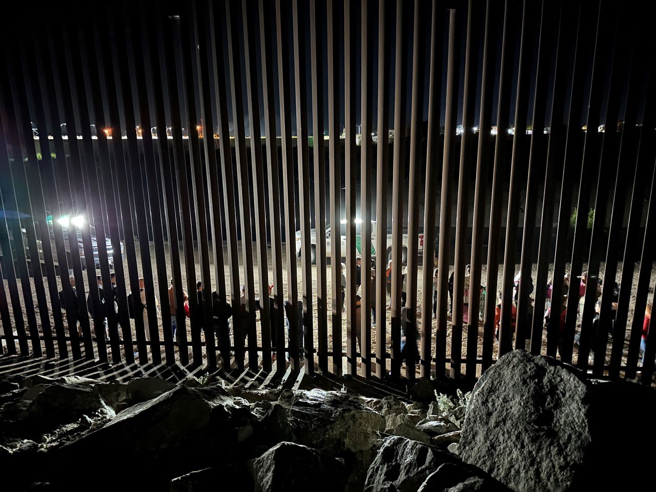 Border patrol agents interview and process a group of 30 migrants, many from South America, on June 3.