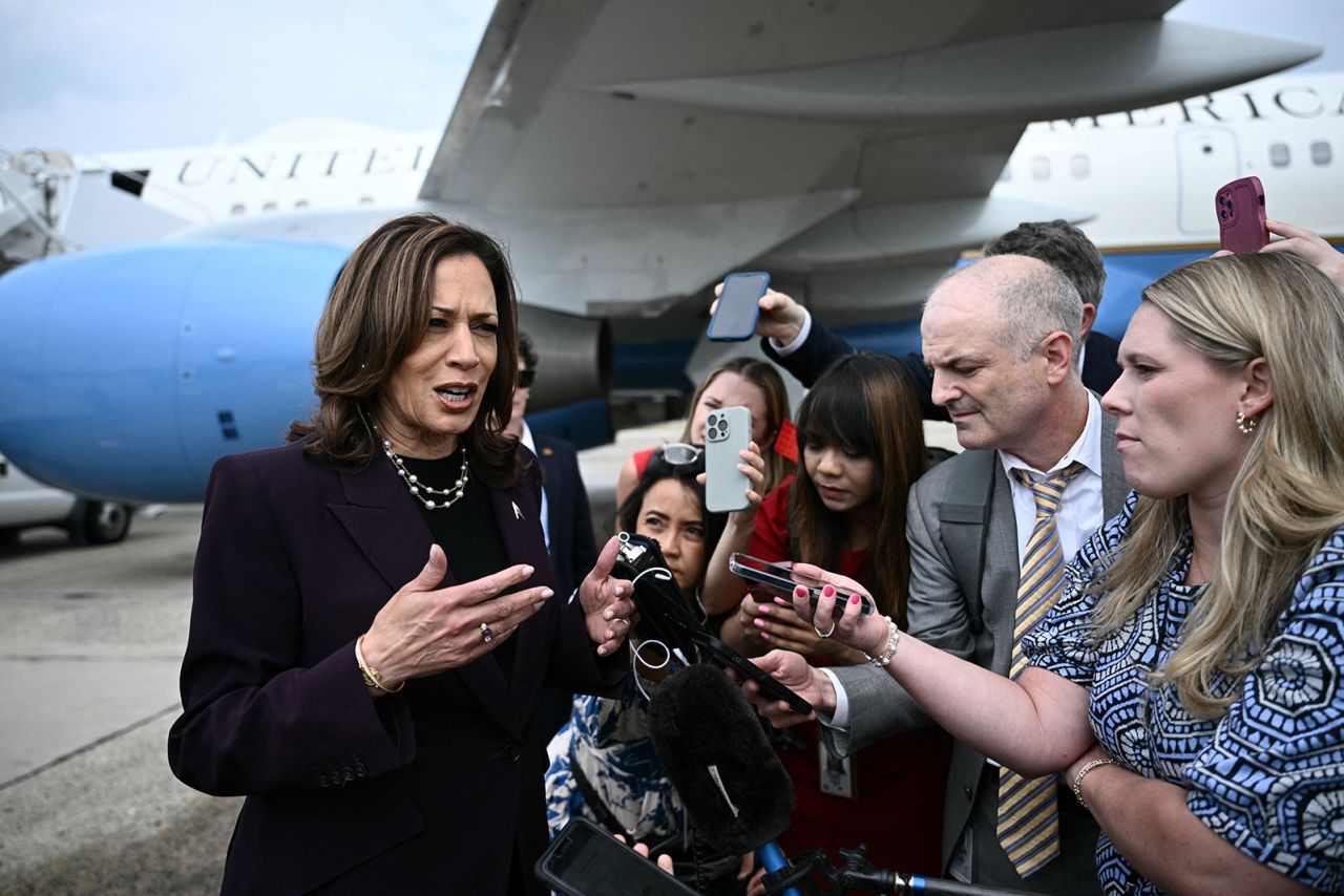 Vice President Kamala Harris, Democratic presidential candidate, speaks to reporters upon arrival at Joint Base Andrews in Maryland on July 25.