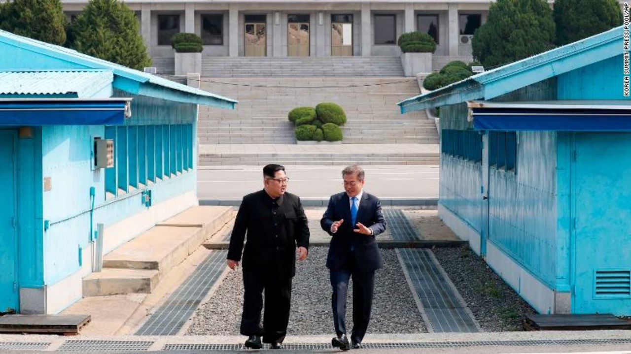 Moon and Kim on the southern side of the demilitarized zone.