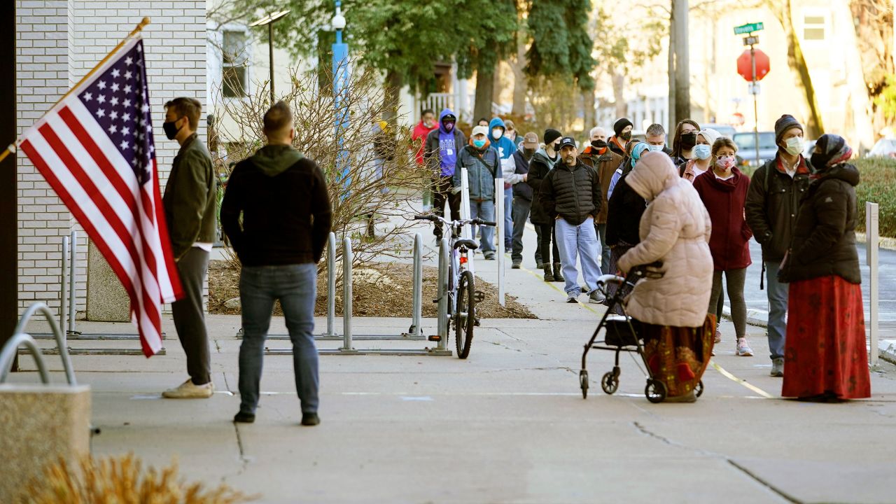 Voters wait to cast their votes on November 3 at the Minneapolis College of Art and Design in Minnesota. 
