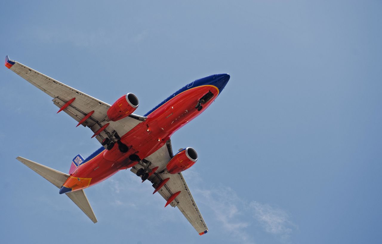 A Southwest Airlines passenger jet makes its final approach to Tampa International Airport 