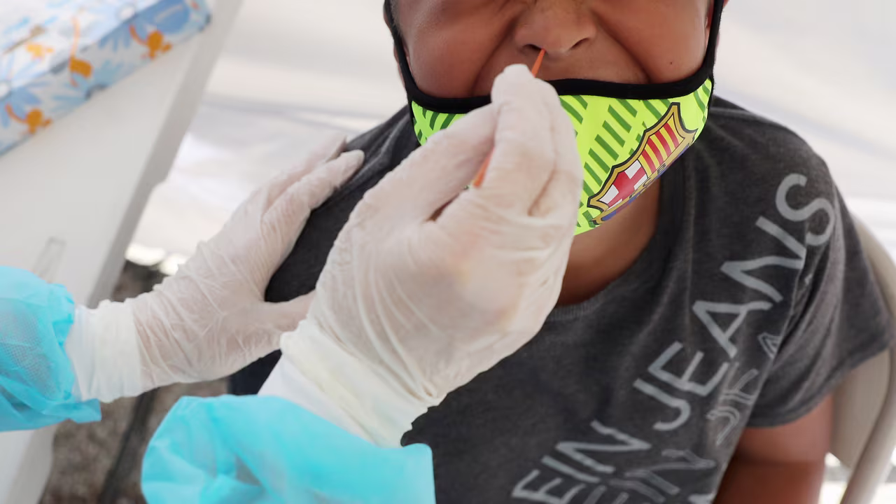 A boy receives a free Covid-19 test at a St. John's Well Child & Family Center clinic outside of Walker Temple AME Church in Los Angeles on July 15. 