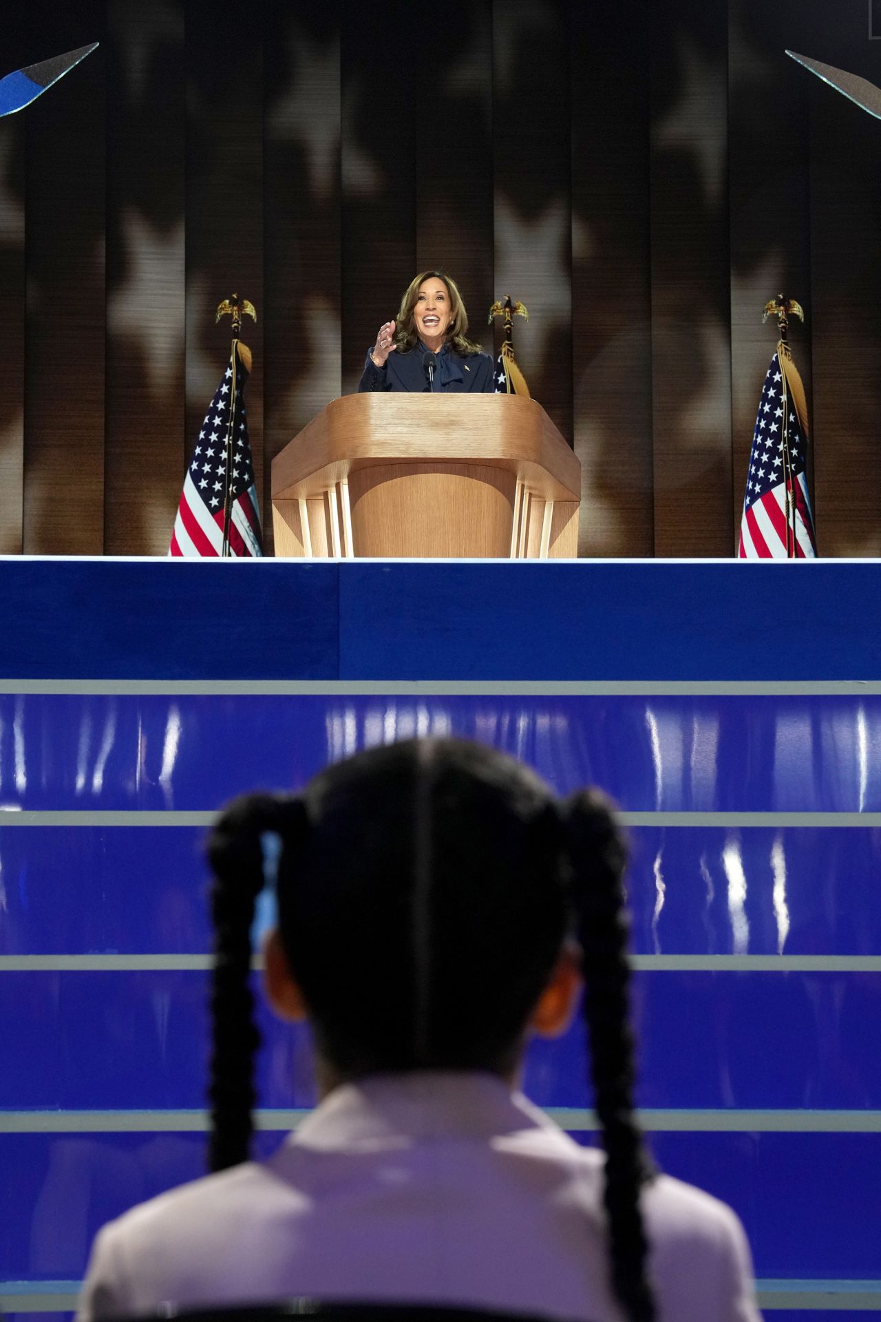 Amara Ajagu watches as Vice President Kamala Harris, the Democratic presidential nominee, speaks on the fourth day of the Democratic National Convention at the United Center in Chicago, on August 22.