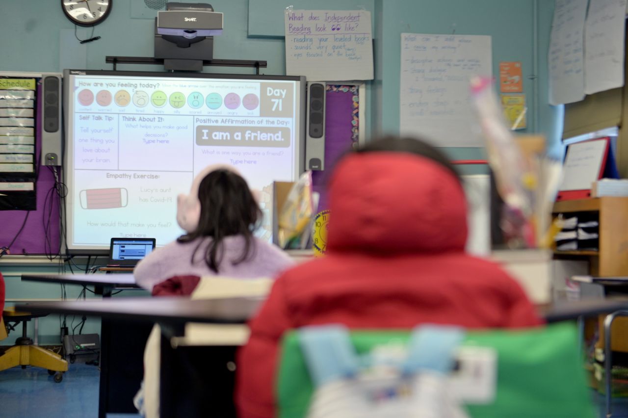 Students sit in class at Yung Wing School P.S. 124 on January 13 in New York City. 