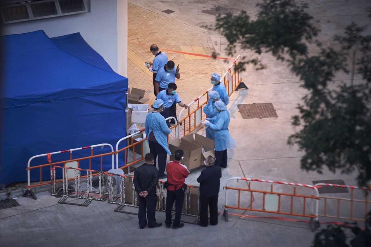 Medical professionals wear protective gear at a coronavirus quarantine facility in Chun Yeung Estate, in Hong Kong on February 23.