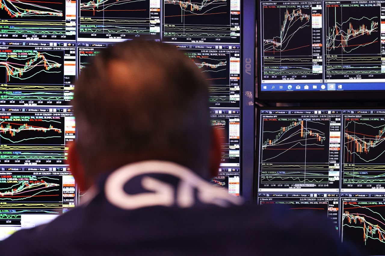 Traders work on the floor of the New York Stock Exchange during afternoon trading on July 26.