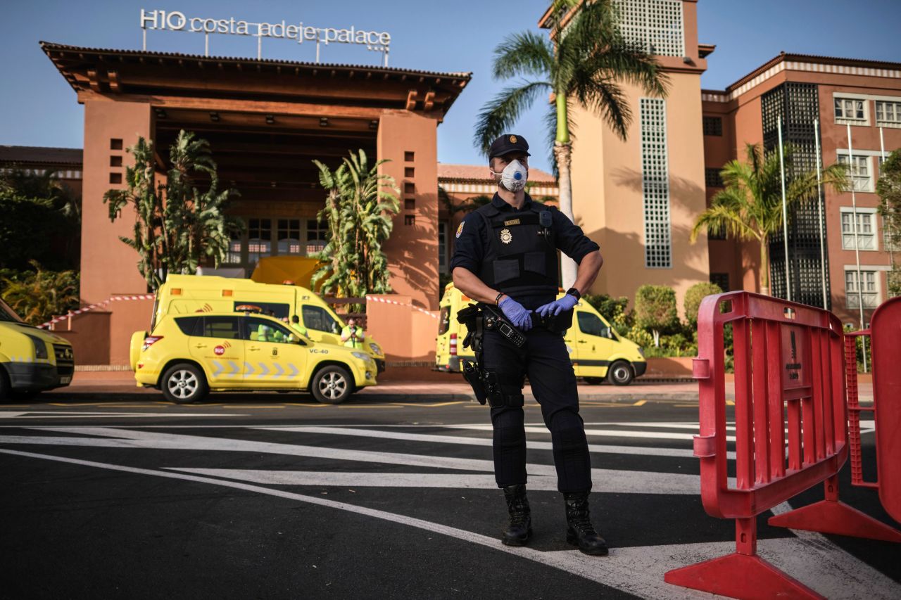 An officer stands in front of the H10 Costa Adeje Palace hotel in Tenerife, Spain on February 26.