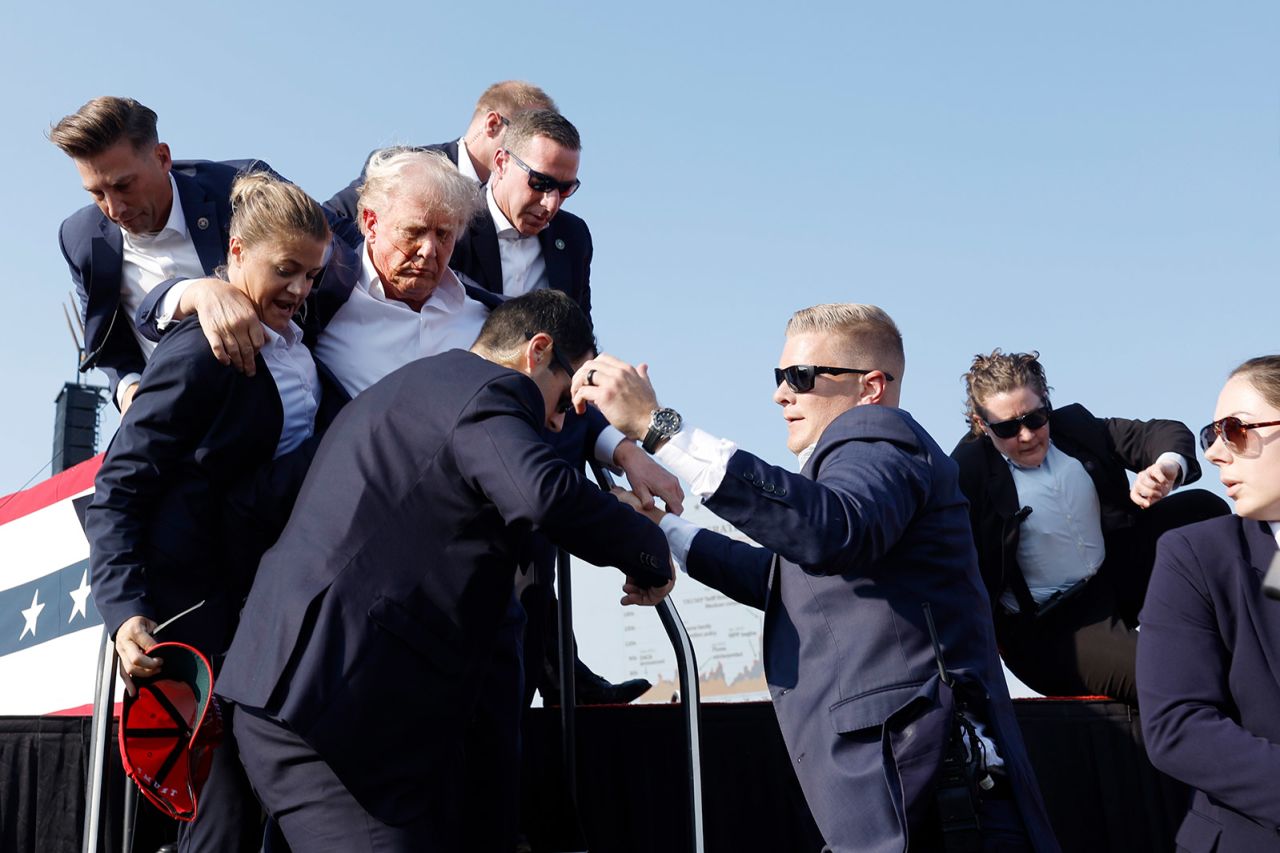 Republican presidential candidate former President Donald Trump is rushed offstage after an assassination attempt during a rally in Butler, Pennsylvania on July 13.