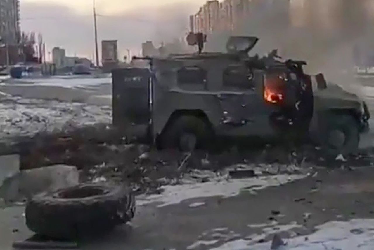 A screen grab from a video shows a Russian armored vehicle burning after it was destroyed by Ukrainian forces in Kharkiv, Ukraine, Sunday, February 27.