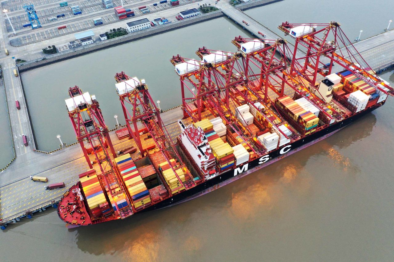 Containers sit stacked on a cargo ship berthed at Zhoushan Port in China, on February 4.