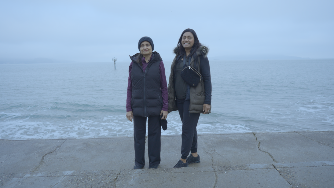 Jyoti Sarolia and her mother, Savita Patel, stand together in a scene from 