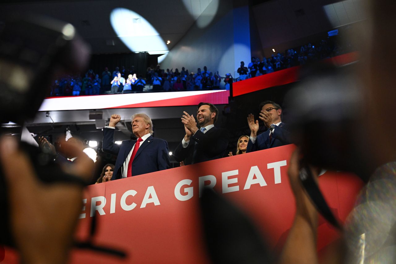 Former President Donald Trump stands with his running mate, Sen. JD Vance, during the Republican National Convention on Monday.