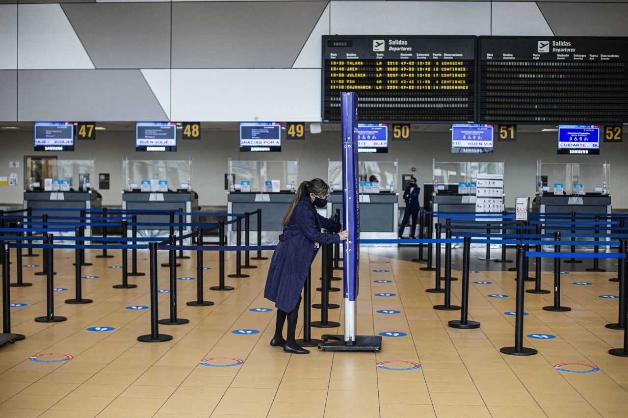 An airport worker is seen at the Jorge Chavez international airport in Lima, Peru, on July 17.