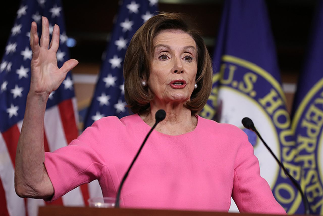 Pelosi talks to reporters at a news conference on Thursday, March 26.