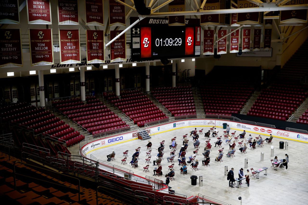 Students wait for 15 minutes in an observation area after receiving the Pfizer-BioNTech Covid-19 vaccine inside Boston Colleges Conte Forum in Boston on April 26.