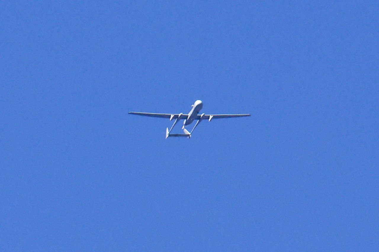 An Israeli drone is seen flying over the border area between Gaza and southern Israel on November 17. 