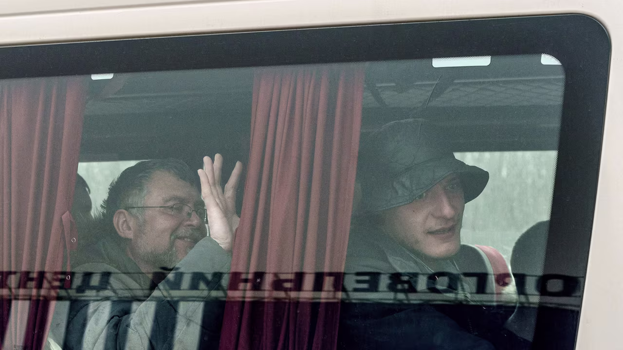 Evacuees arrive on a bus at the registration center in Zaporizhzhia, Ukraine on April 1. 